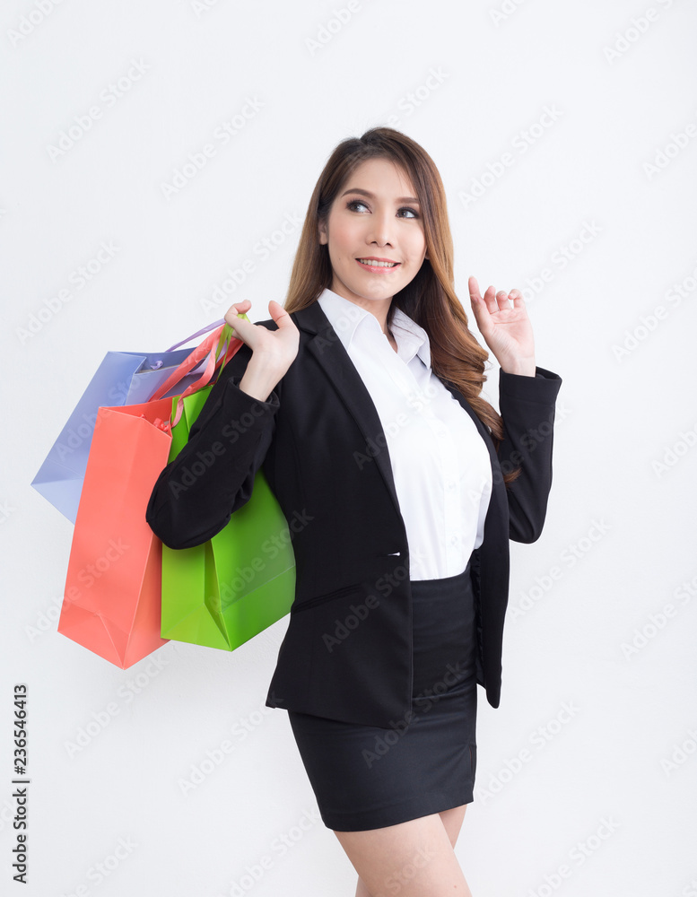 Beautiful businesswoman with shopping bags Beautiful businesswoman with shopping bags
