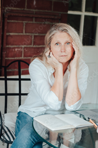 Blonde woman looking depressed