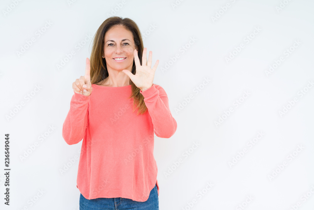 Beautiful middle age woman over isolated background showing and pointing up with fingers number six while smiling confident and happy. Beautiful middle age woman over isolated background showing and pointing up with fingers number six while smiling confident and happy.