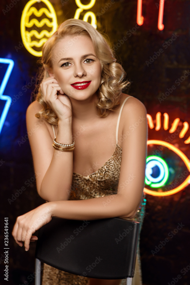 Fototapeta premium Pretty young girl dressed at pin-up style