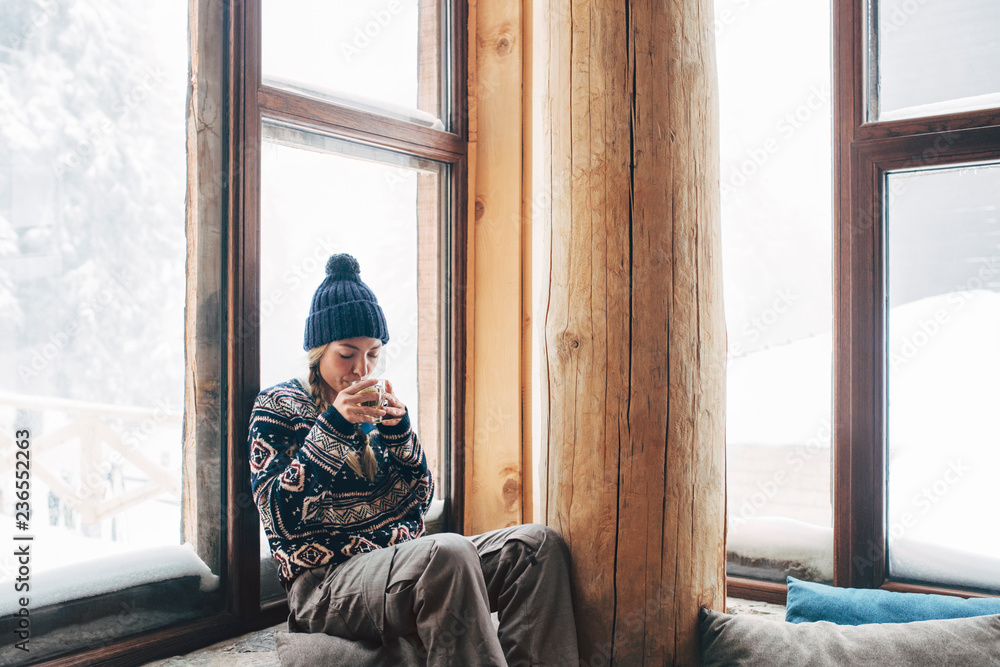 Woman Enjoying Tea in Log Cabin Woman Enjoying Tea in Log Cabin