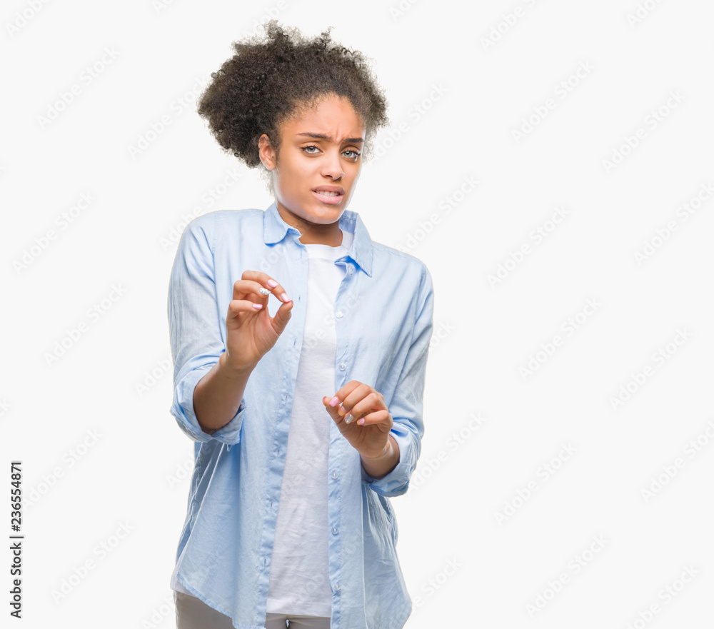 Young afro american woman over isolated background disgusted expression, displeased and fearful doing disgust face because aversion reaction. With hands raised. Annoying concept. Young afro american woman over isolated background disgusted expression, displeased and fearful doing disgust face because aversion reaction. With hands raised. Annoying concept.