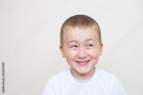 five year old boy with a funny facial expression