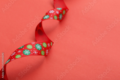 Christmas ribbon on paper background