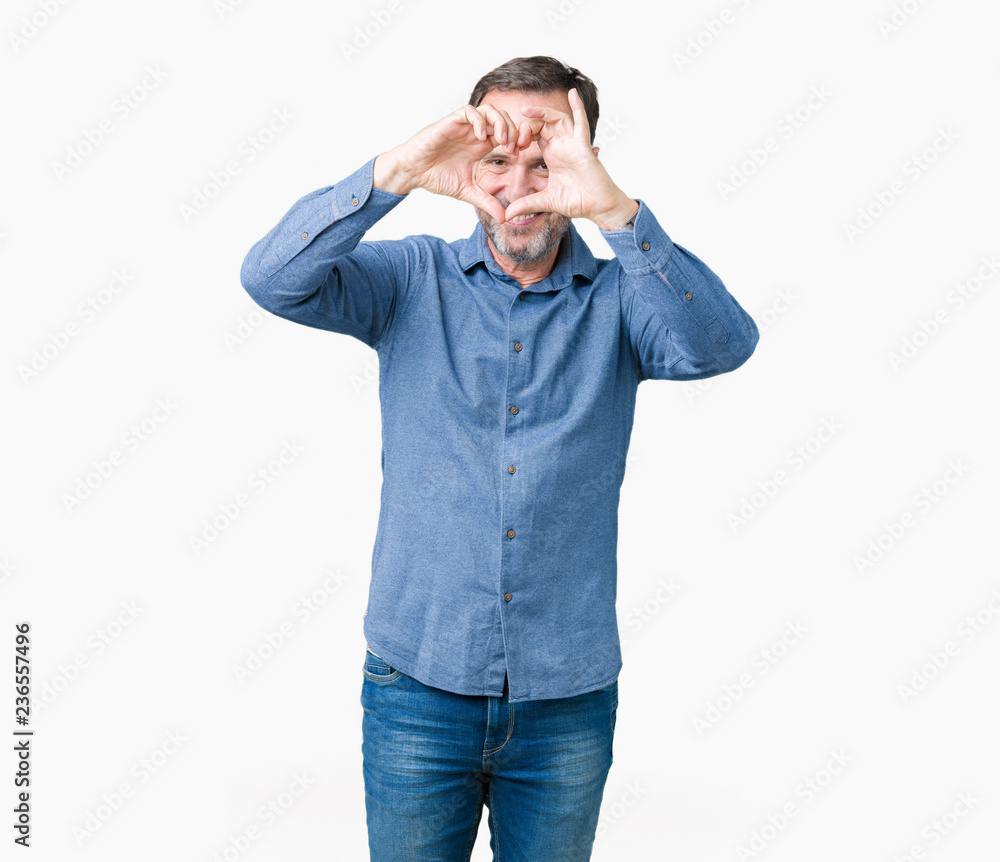 Handsome middle age elegant senior man over isolated background Doing heart shape with hand and fingers smiling looking through sign Handsome middle age elegant senior man over isolated background Doing heart shape with hand and fingers smiling looking through sign