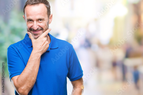 Middle age hoary senior man over isolated background looking confident at the camera with smile with crossed arms and hand raised on chin. Thinking positive.