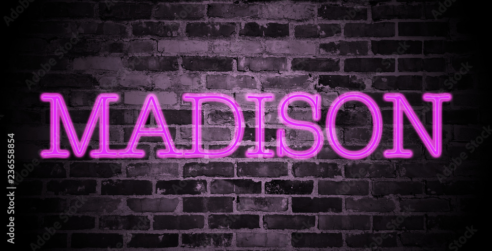 Obraz premium first name Madison in pink neon on brick wall