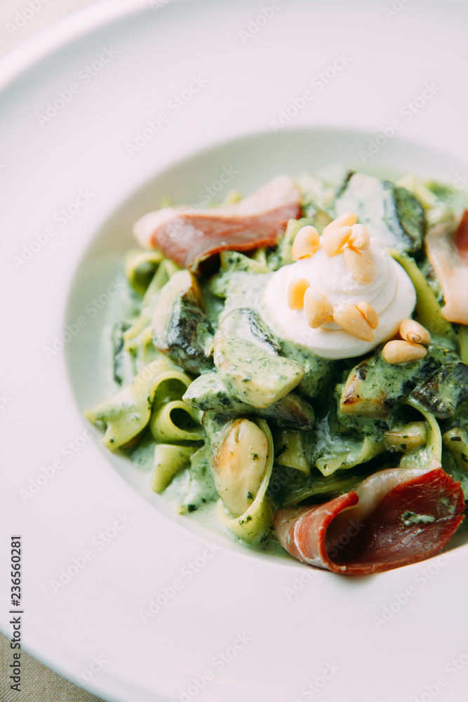 Pasta with cream sauce and shrimp. Restaurant dishes with a beautiful serving. Pasta with cream sauce and shrimp. Restaurant dishes with a beautiful serving.