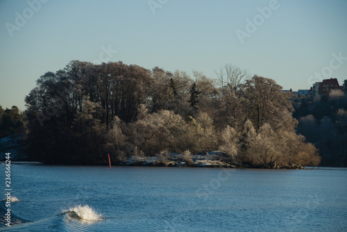 Sea a cold frosty day at the lake Malaren by boat in Stockholm photo