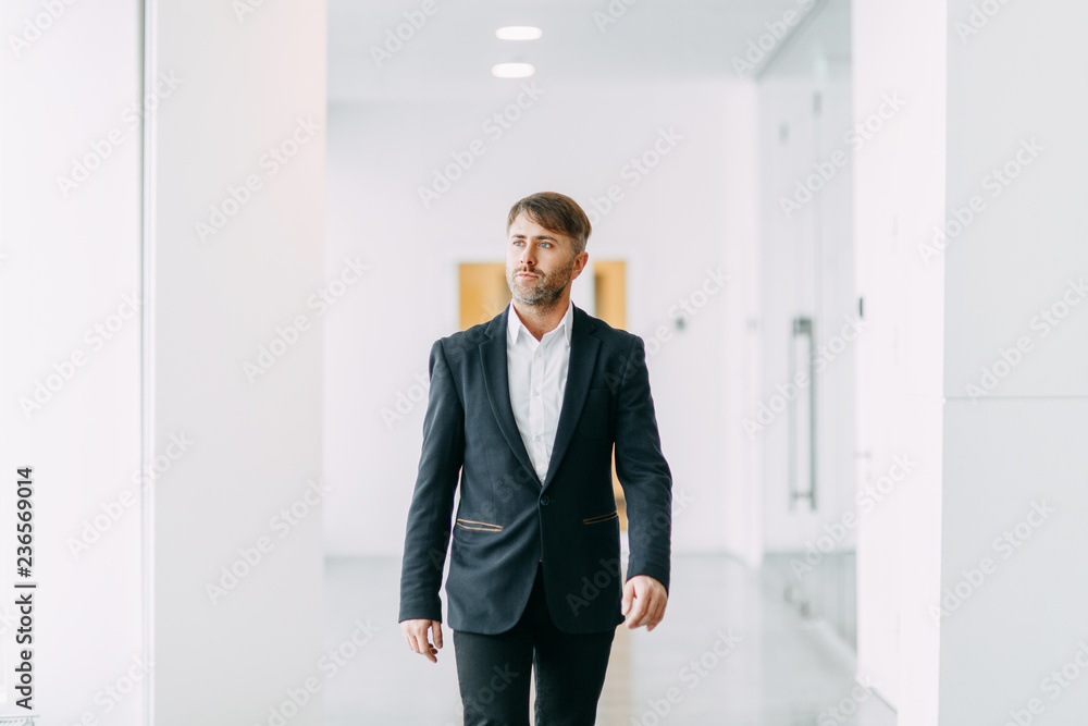 Businessman goes to work. Bright interior and office. Businessman goes to work. Bright interior and office.