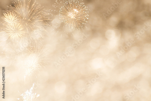 Gold bokeh with Firework for New year or Celebrate background