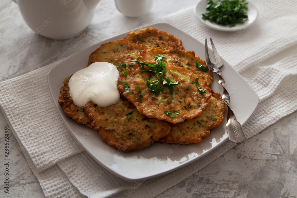 Vegetable pancakes with sour cream and parsley Vegetable pancakes with sour cream and parsley