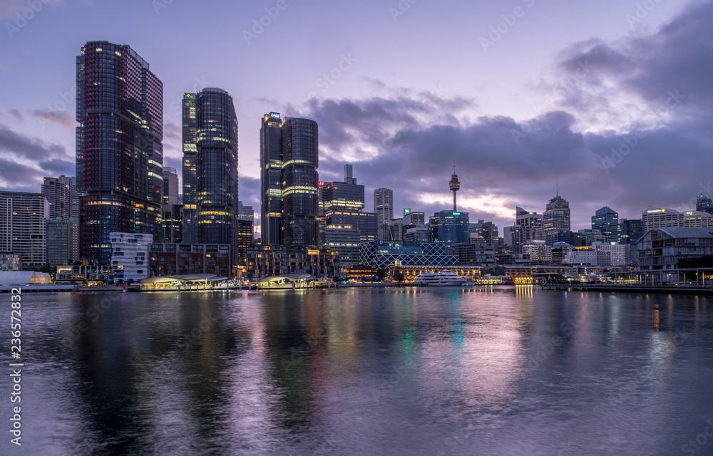 Sydney's Barangaroo office towers and city under dawn clouds