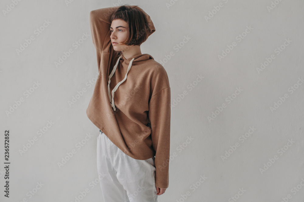 Pretty stylish woman in hoodie
Pretty stylish woman in hoodie