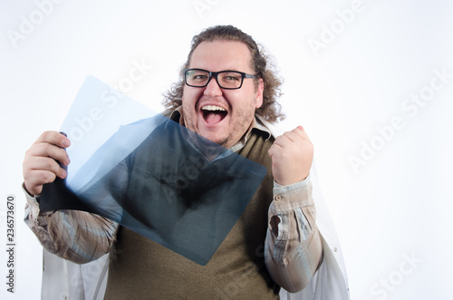 Funny fat doctor. White background. photo