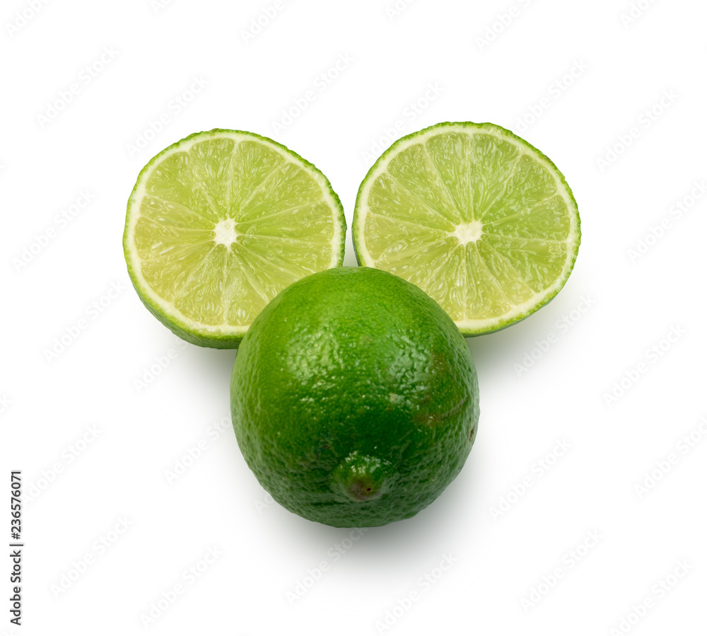 Sour key whole and sliced lime isolated Sour key whole and sliced lime isolated