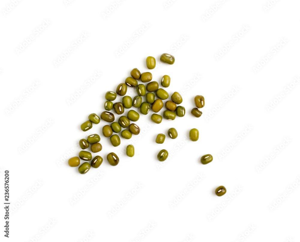Dry raw mung beans or vigna radiata seeds isolated on white Dry raw mung beans or vigna radiata seeds isolated on white