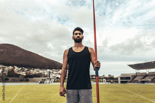 Принти на полотні Athlete standing holding a javelin