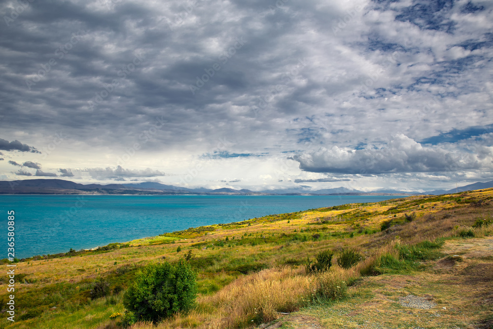 Lake Pukaki view with beautiful turquoise water, South Island, New Zealand Lake Pukaki view with beautiful turquoise water, South Island, New Zealand