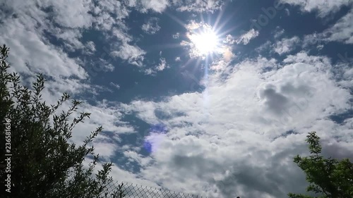 Time lapse of clouds passing photo