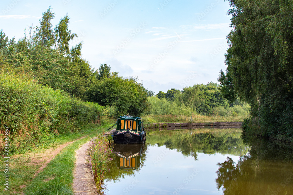 Fototapeta premium Narrow boat on the Trent and Mersey canal in Cheshire UK