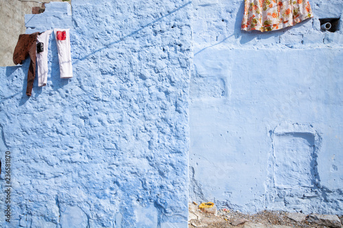 Blue wall of house in Jodhpur city, Rajasthan State, India © pomiti