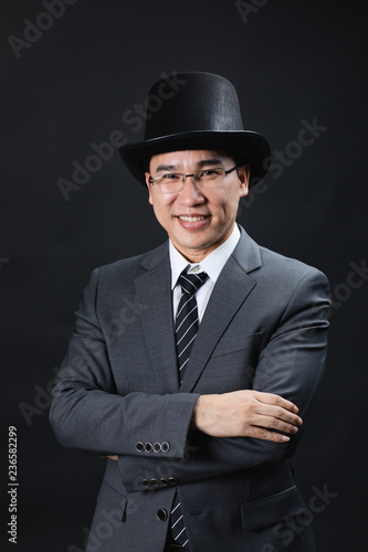 Portrait of Asian man in formal suit.