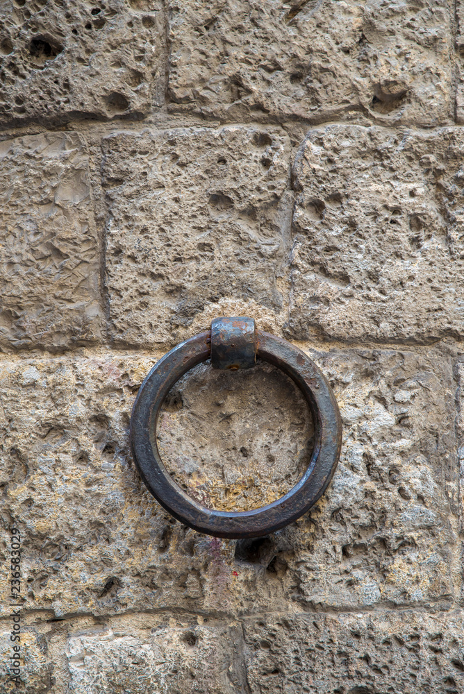 iron ring on a stone wall iron ring on a stone wall