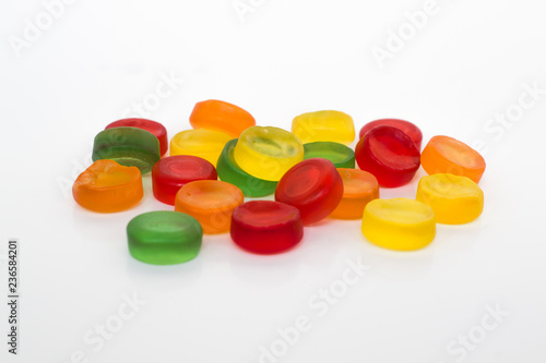 Round gummy candy isolated on white background