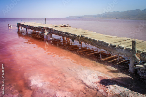 The unusual pink Lake Urmia, full of salt and a picturesque bridge photo