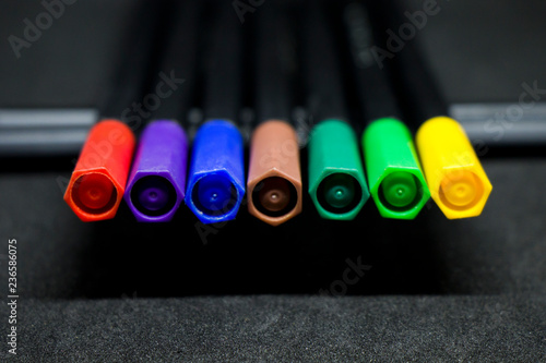 drawing instrument, colorful markers, markers set, all colors, multicolored on the black background