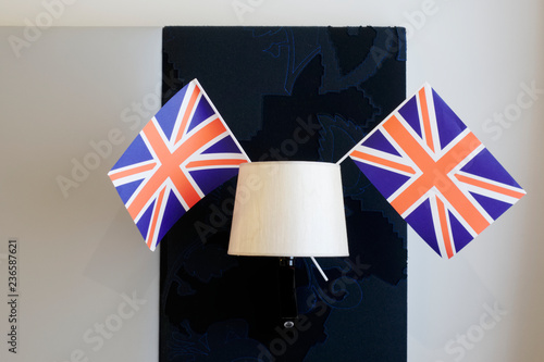 Union Jack flag hanging from light lamp in hotel room uk photo