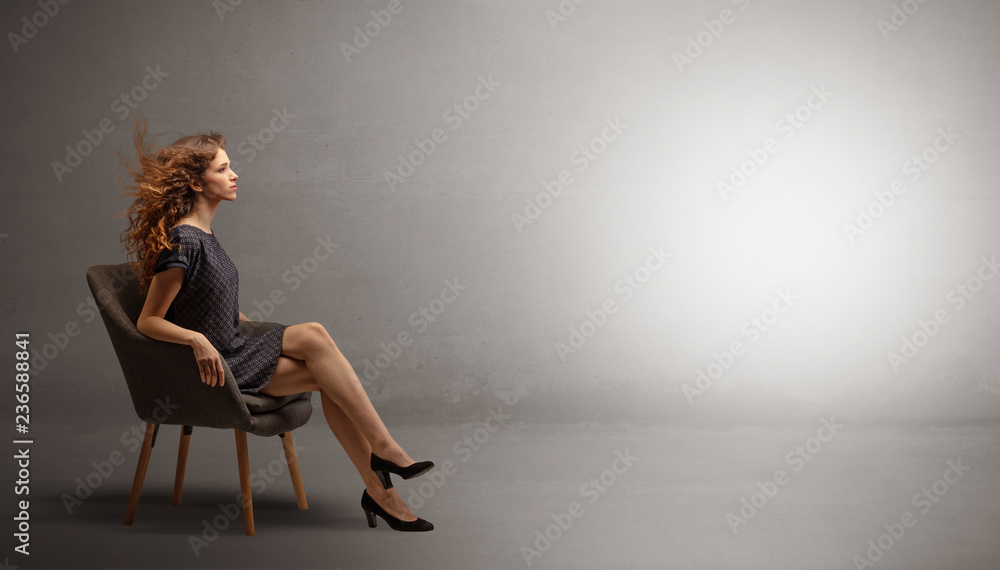Young beautiful woman modeling in an empty studio
Young beautiful woman modeling in an empty studio