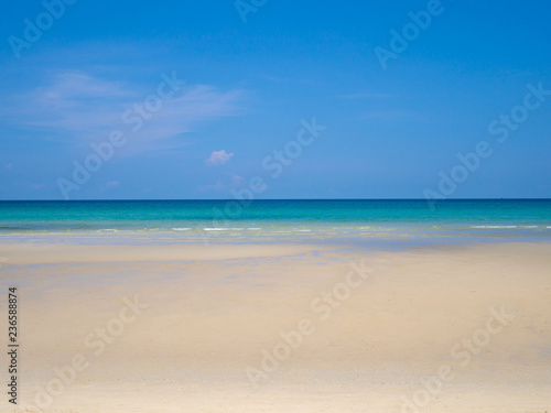 Blue sea sky and white sand at nice tropical beach sunny day in summer. © ieang