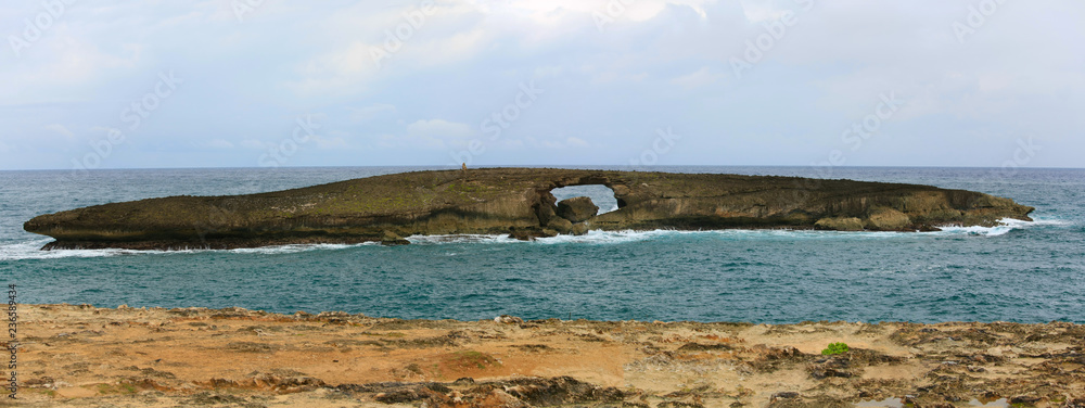 Small weather-beaten island off the coast of Laie Point, Oahu, Hawaii