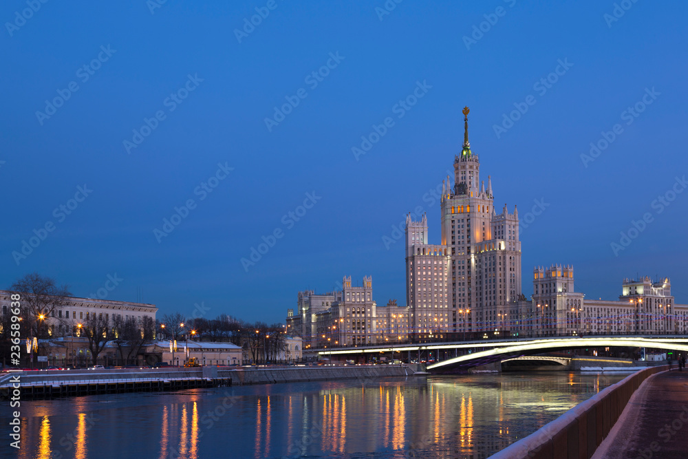 Obraz premium One of seven Stalin skyscrapers: the high-rise building on Kotelnicheskaya Embankment in night illumination, Moscow