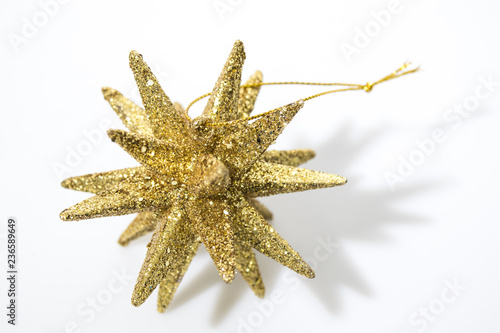 Gold christmas decoration isolated in a white background