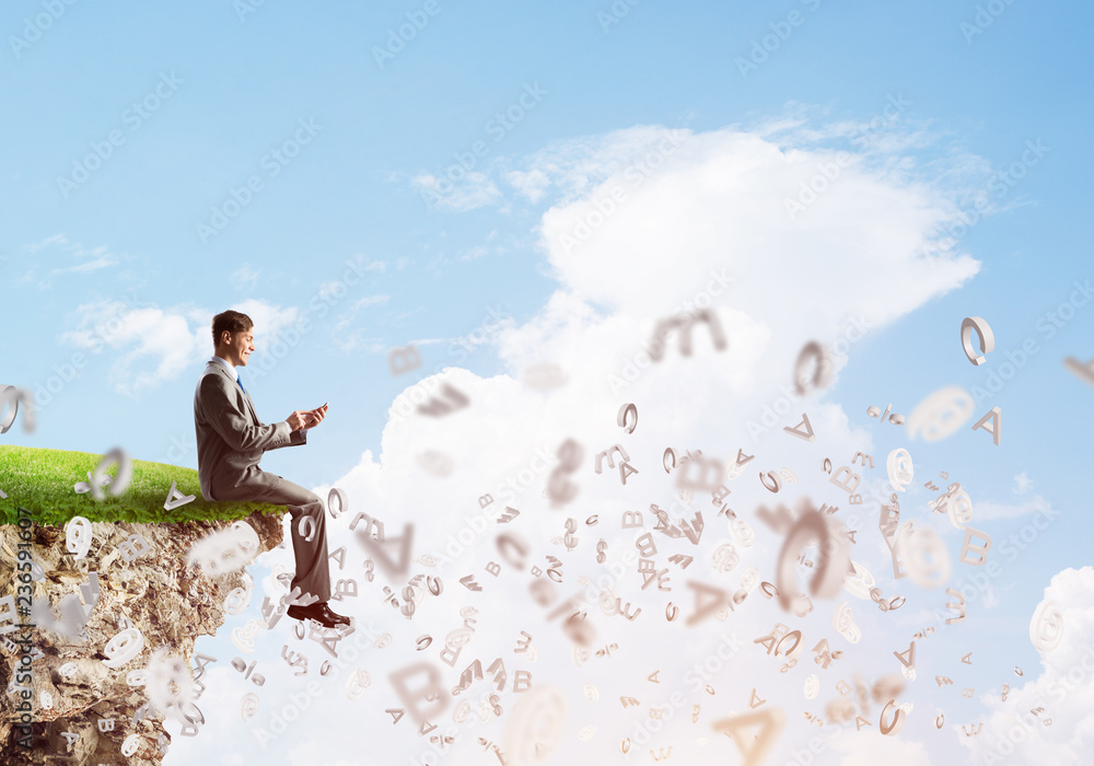 Student guy in suit with smartphone in hands send message Student guy in suit with smartphone in hands send message