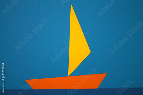 Paper colors are red, yellow, purple, blue.Sea, yacht, sail, tropics, sport.