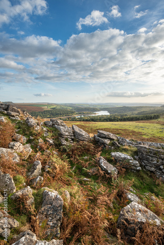 Stunning Autumn sunset landscape image of view from Leather Tor towards Burrator Reservoir in Dartmoor National Park photo