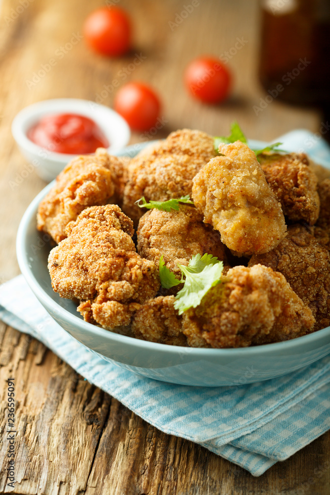 Homemade chicken nuggets with tomato sauce Homemade chicken nuggets with tomato sauce