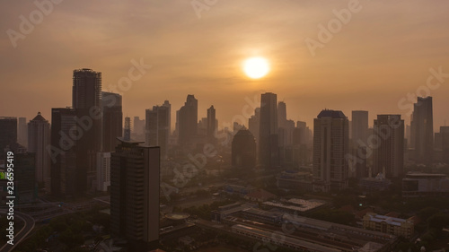 Jakarta cityscape with office buildings at sunset © Creativa Images