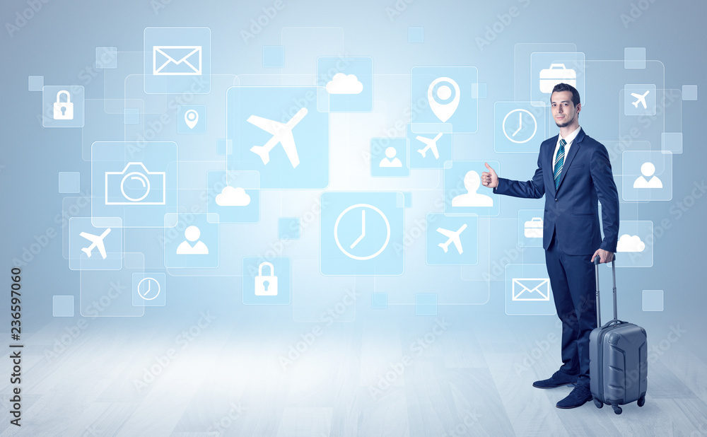 Businessman departs to a business trip with social media and travel symbol concept
Businessman departs to a business trip with social media and travel symbol concept
