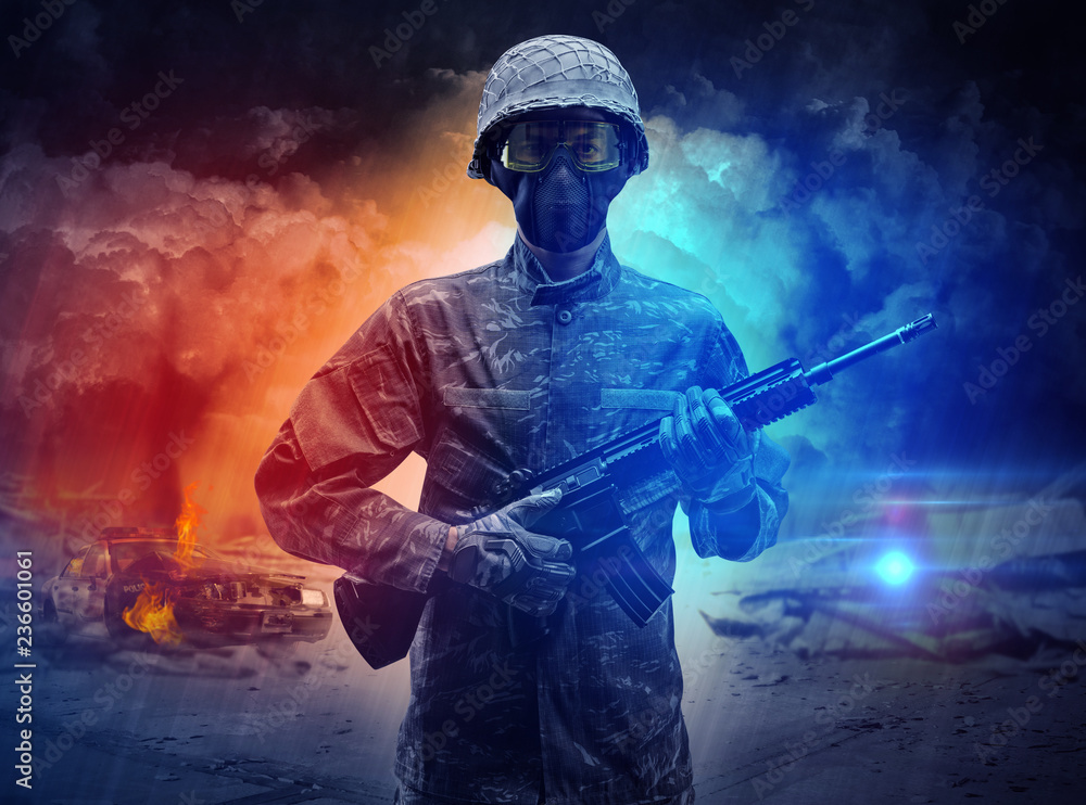 Fototapeta premium Armed soldier with sniper in the middle of a dust storm 
