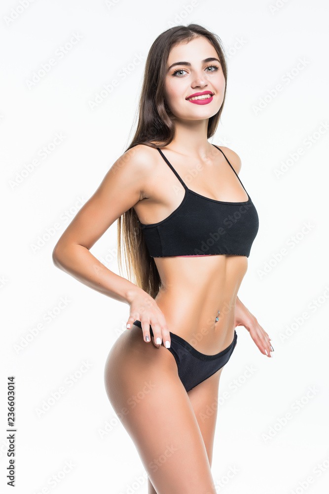 Portrait of a beautiful woman in sexy black lingerie posing isolated on a white background Portrait of a beautiful woman in sexy black lingerie posing isolated on a white background