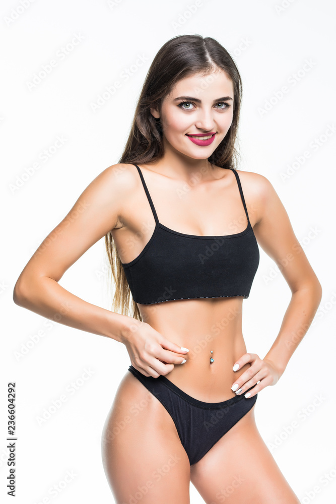 Beautiful woman with perfect figure in black underwear isolated on white background Beautiful woman with perfect figure in black underwear isolated on white background
