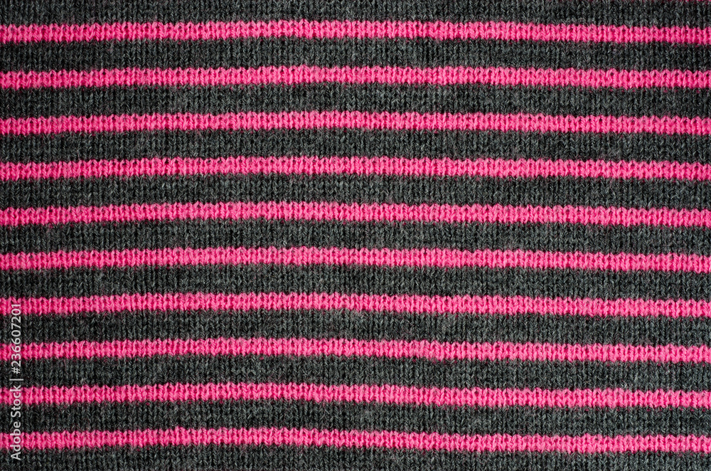 The texture of the wool fabric in black and red stripes The texture of the wool fabric in black and red stripes