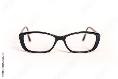 Stylish glasses in a plastic black frame on a white background with dioptres