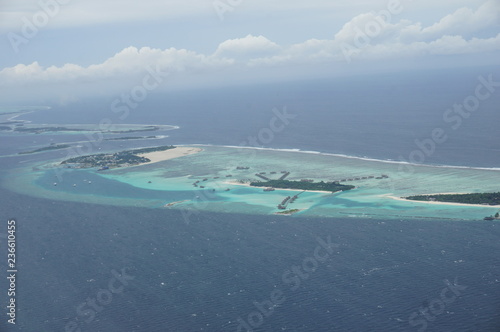 Air plane view over atoll in Maldives island