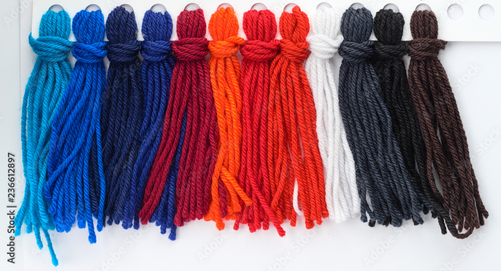 Fototapeta premium multicolored wool threads, palette for color selection